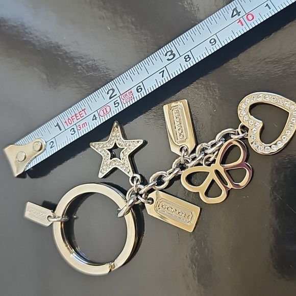 Coach NWOT Silver Keychain with Heart, Star, and Butterfly Charms - Picture 6 of 7